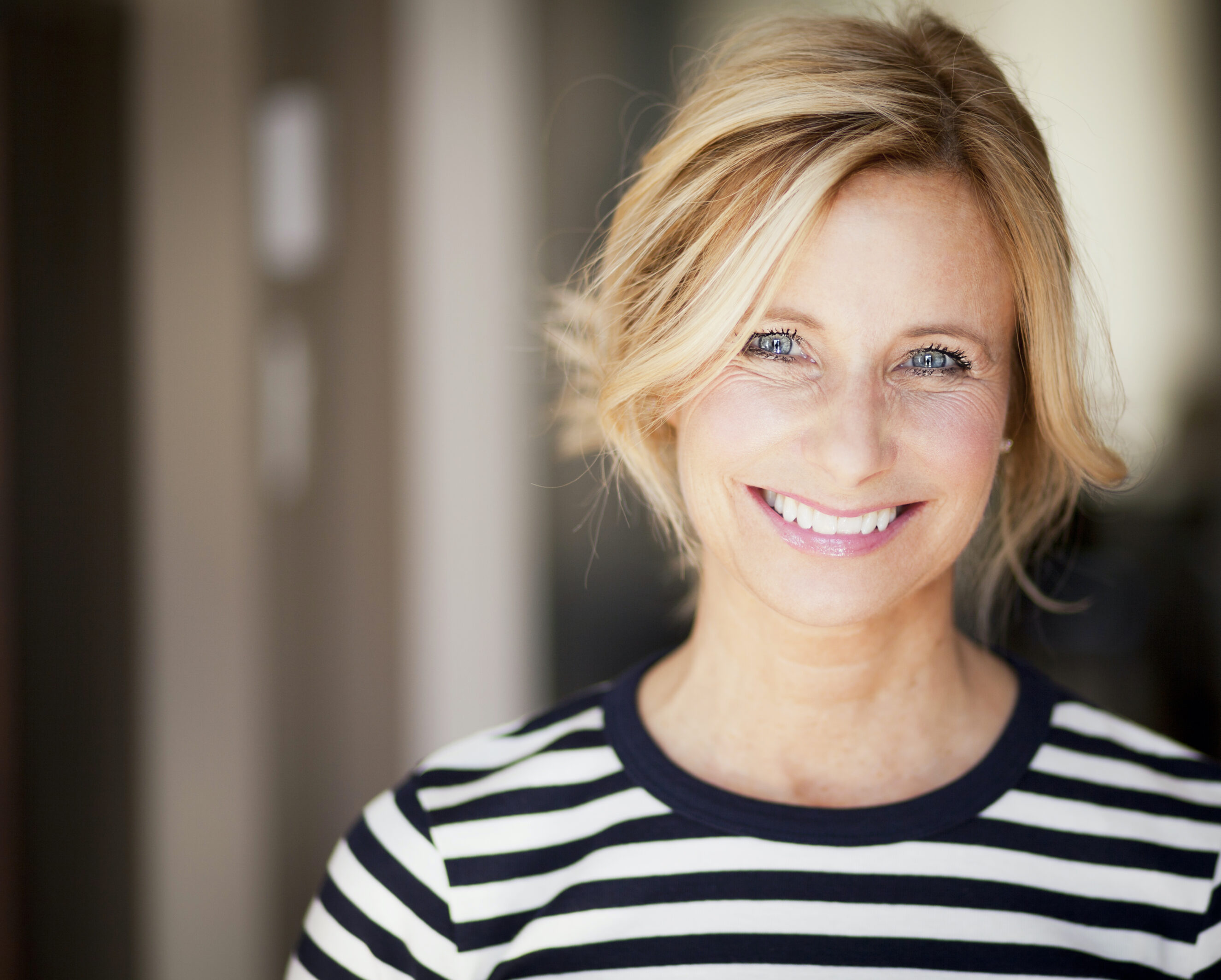 Closeup Of A Mature woman smiling At The Camera